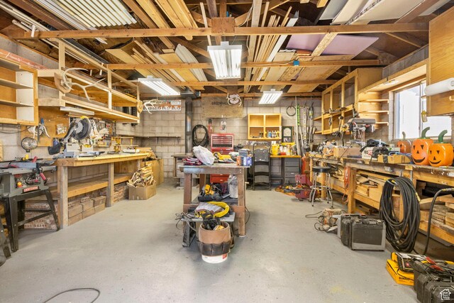 440 W Cottonwood Ln, Ferron, UT 84523 - interior space with concrete flooring and a workshop area