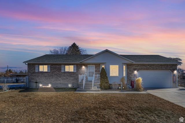440 W Cottonwood Ln, Ferron, UT 84523 - ranch-style house featuring a garage and a lawn