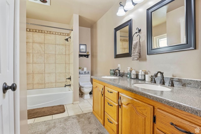 440 W Cottonwood Ln, Ferron, UT 84523 - full bathroom featuring tile patterned floors, toilet, tiled shower / bath combo, and vanity