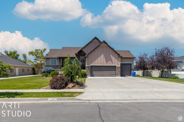 1679 N 4400 W, Plain City, UT 84404 - craftsman-style house with a garage and a front yard