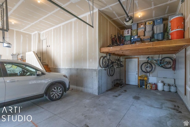 1679 N 4400 W, Plain City, UT 84404 - garage featuring a garage door opener