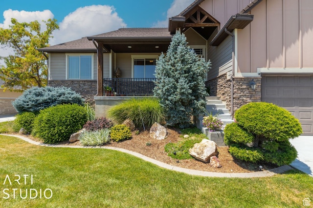 1679 N 4400 W, Plain City, UT 84404 - view of front facade featuring a porch, a garage, and a front lawn