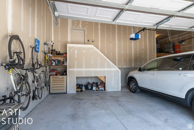 1679 N 4400 W, Plain City, UT 84404 - garage featuring a garage door opener