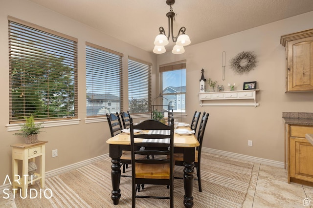 1679 N 4400 W, Plain City, UT 84404 - tiled dining area with an inviting chandelier