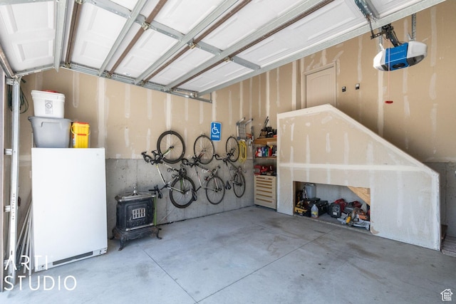 1679 N 4400 W, Plain City, UT 84404 - garage with a garage door opener and refrigerator