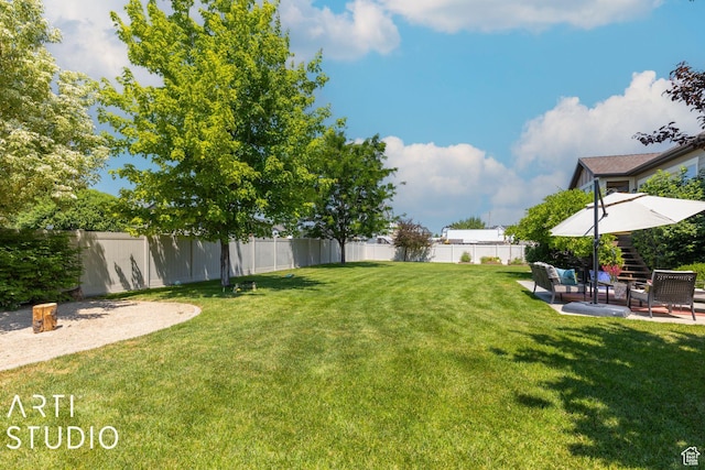 1679 N 4400 W, Plain City, UT 84404 - view of yard featuring an outdoor hangout area and a patio area