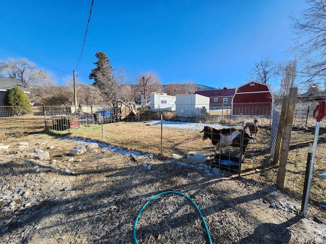 view of yard with an outdoor structure