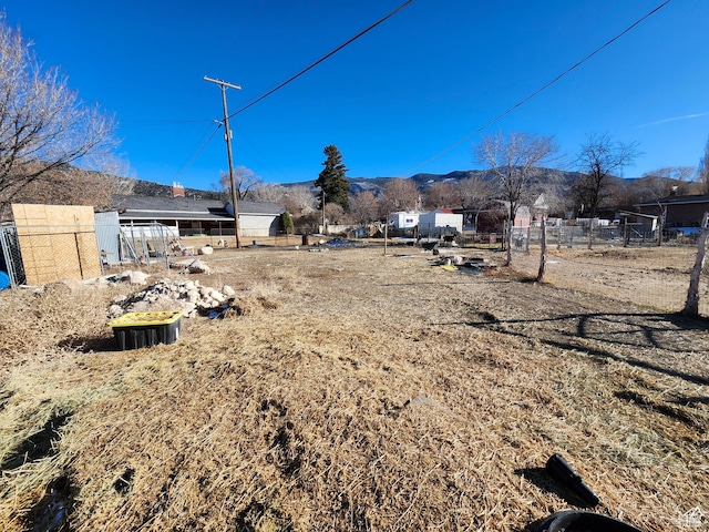 view of yard with a mountain view