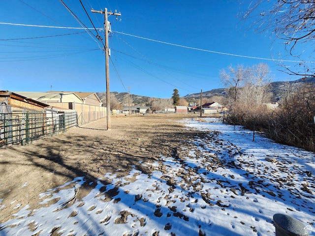 view of yard covered in snow