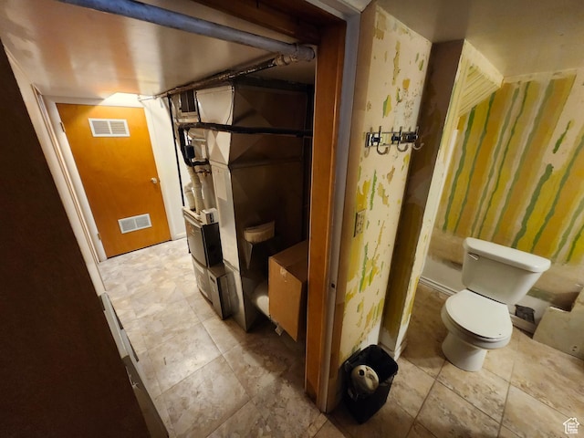 bathroom featuring toilet