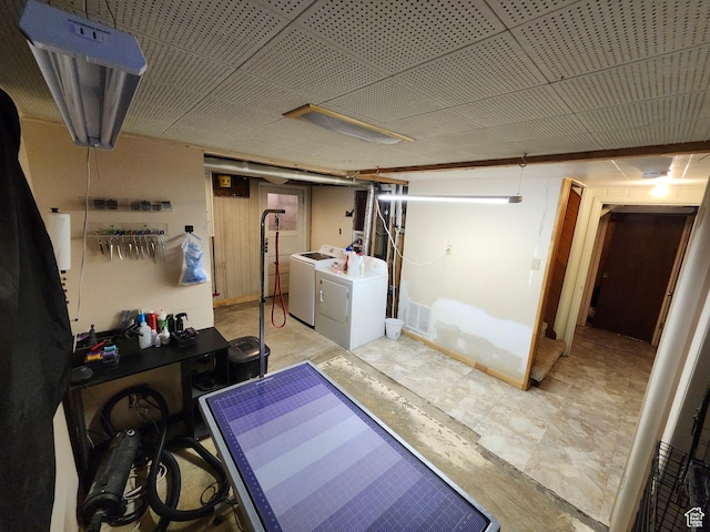 basement with separate washer and dryer