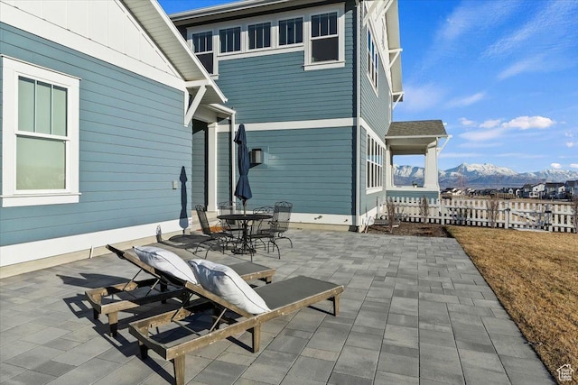 view of patio / terrace featuring a mountain view