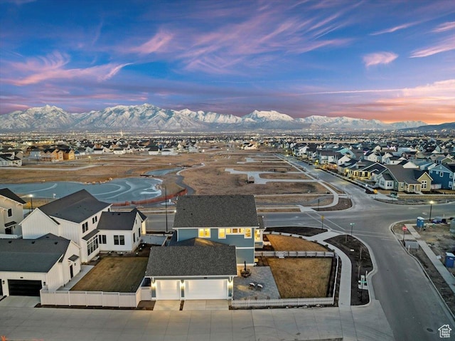 aerial view at dusk with a mountain view