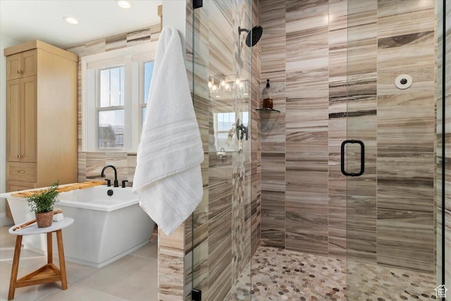bathroom featuring plus walk in shower