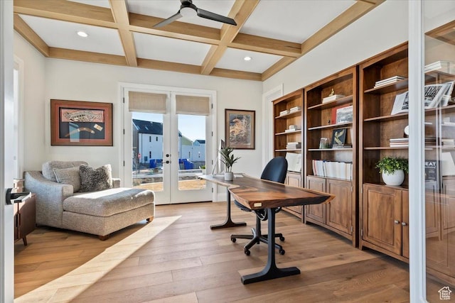 office with french doors, coffered ceiling, beam ceiling, and light hardwood / wood-style flooring