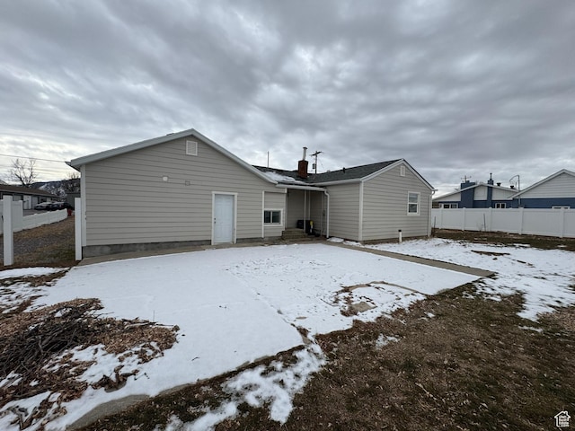 view of snow covered property