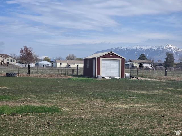 4556 W 4950 S, Hooper, UT 84315 - view of outbuilding featuring a mountain view, fence, and an outdoor structure