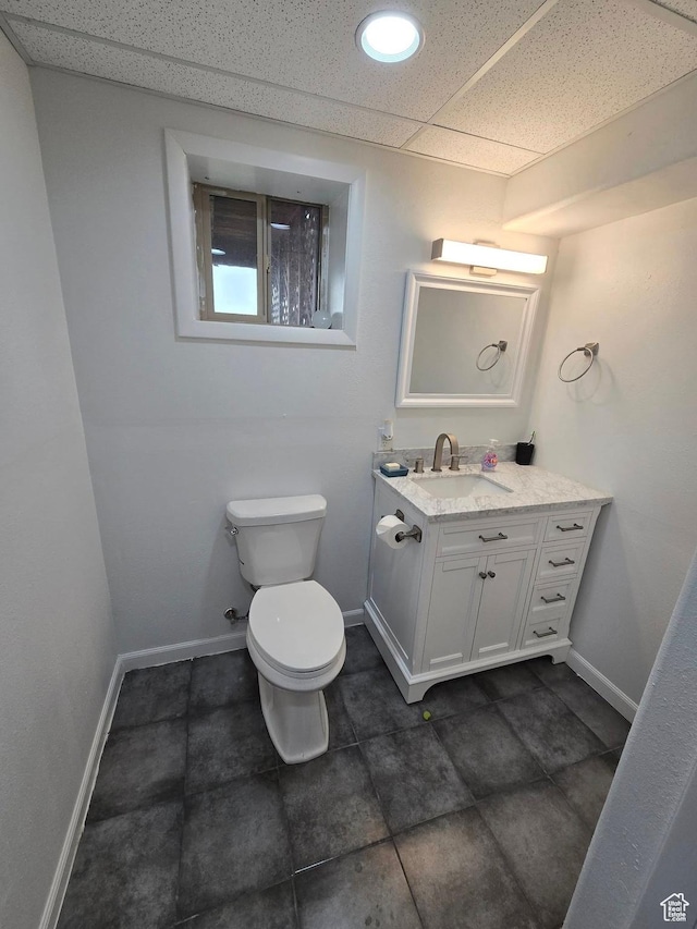 4556 W 4950 S, Hooper, UT 84315 - bathroom with vanity, baseboards, a paneled ceiling, recessed lighting, and toilet