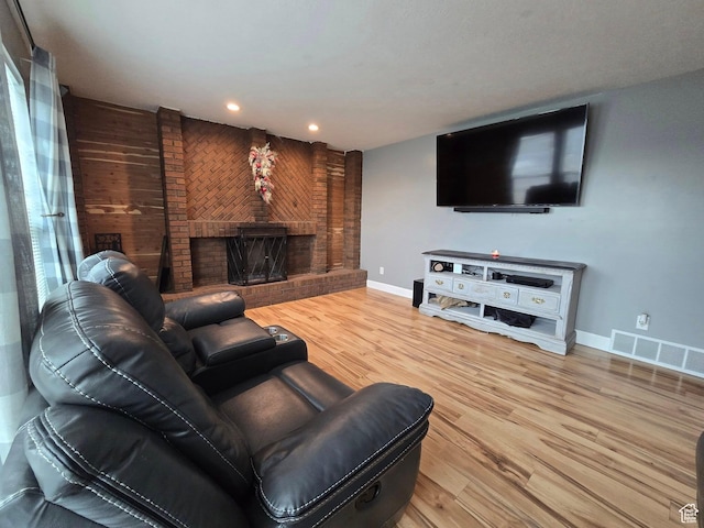 4556 W 4950 S, Hooper, UT 84315 - living area with visible vents, baseboards, a fireplace, recessed lighting, and wood finished floors