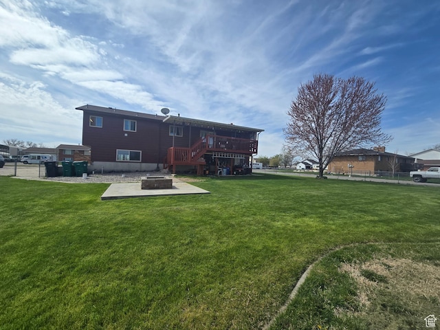 4556 W 4950 S, Hooper, UT 84315 - view of yard with an outdoor fire pit, fence, a deck, and a patio