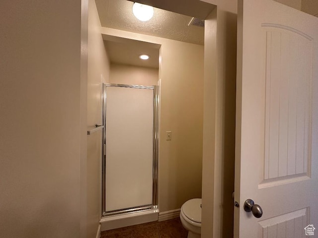 6751 S Sienna Park Ln, Midvale, UT 84047 - bathroom with toilet, a textured ceiling, and walk in shower
