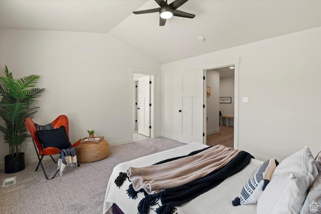 bedroom with lofted ceiling, visible vents, ceiling fan, carpet floors, and baseboards