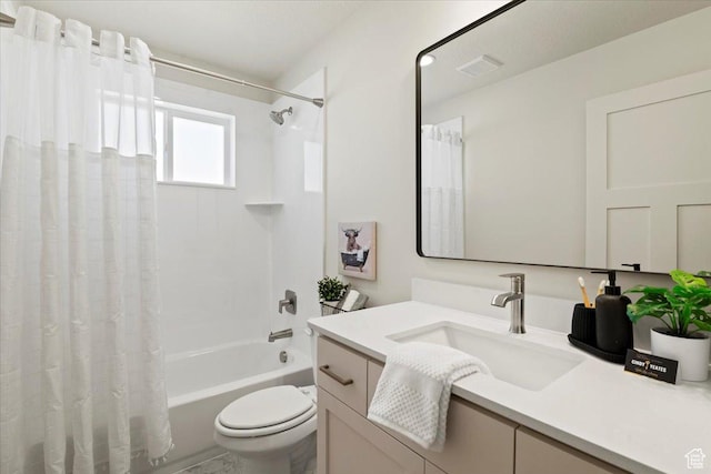 full bath featuring vanity, toilet, visible vents, and shower / bath combo