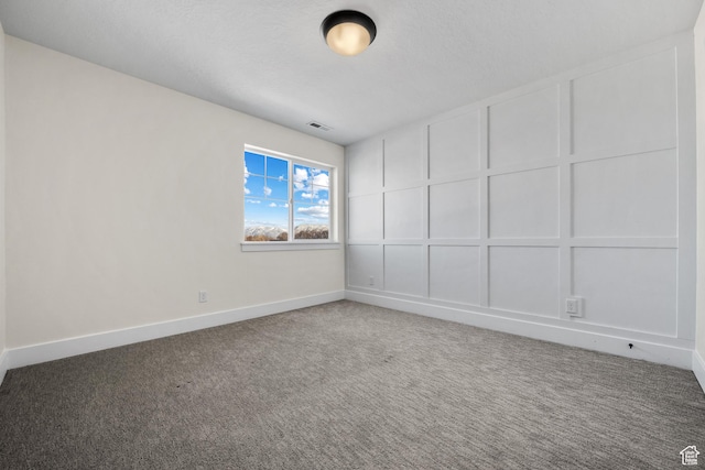 1002 W Temple Rim Ln, Payson, UT 84651 - spare room featuring carpet floors and a textured ceiling