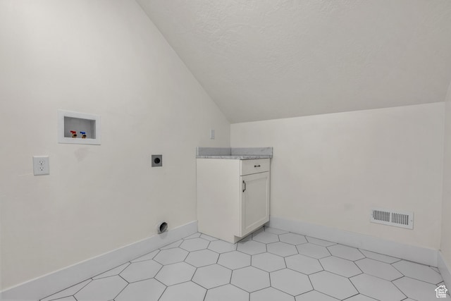 1002 W Temple Rim Ln, Payson, UT 84651 - laundry area featuring cabinets, electric dryer hookup, washer hookup, and a textured ceiling