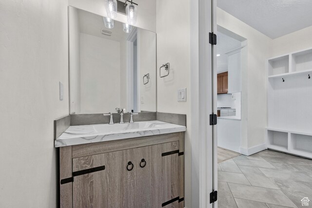 1002 W Temple Rim Ln, Payson, UT 84651 - bathroom with vanity and tile patterned flooring
