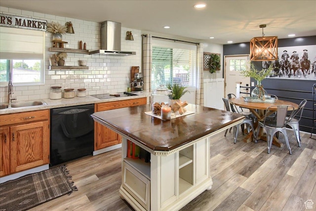 3095 N 275 E, North Ogden, UT 84414 - kitchen with light wood finished floors, black appliances, open shelves, a sink, and wall chimney range hood