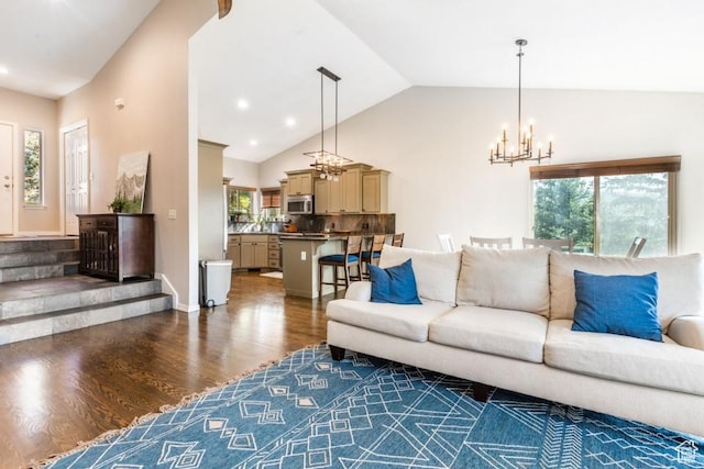 3942 View Pointe Dr, Park City, UT 84098 - living room featuring lofted ceiling, dark hardwood / wood-style floors, and a chandelier