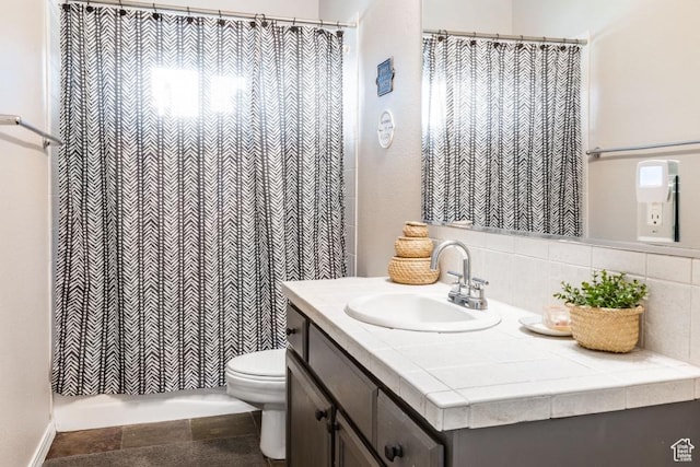 3942 View Pointe Dr, Park City, UT 84098 - bathroom with vanity, backsplash, and toilet