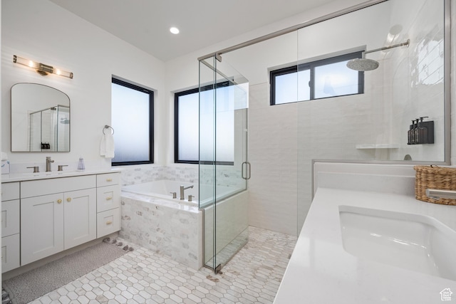 4862 N Sand Cove Cir, St George, UT 84770 - bathroom featuring tile patterned flooring, vanity, and separate shower and tub