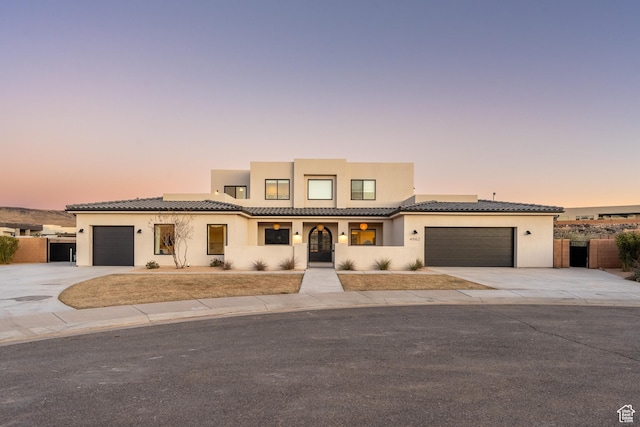view of front of property featuring a garage