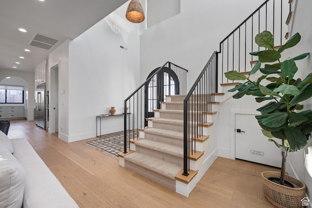 4862 N Sand Cove Cir, St George, UT 84770 - stairway featuring hardwood / wood-style floors