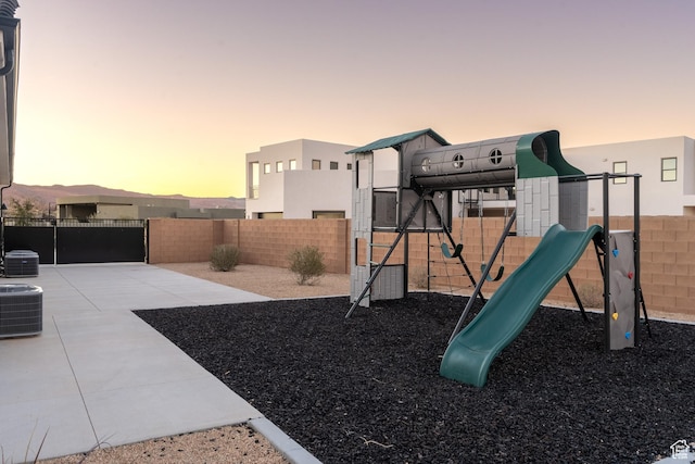 4862 N Sand Cove Cir, St George, UT 84770 - playground at dusk with central air condition unit