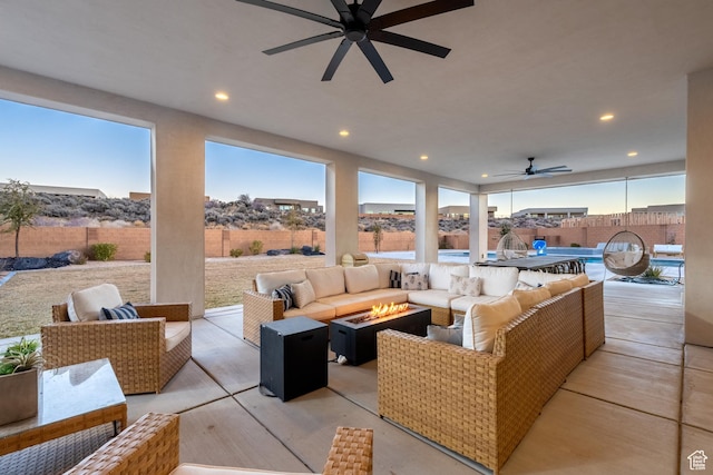 4862 N Sand Cove Cir, St George, UT 84770 - view of patio / terrace with a fenced in pool, pool water feature, an outdoor living space with a fire pit, and ceiling fan