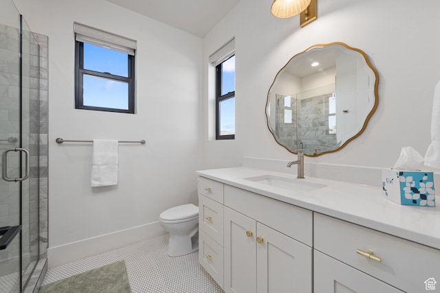 4862 N Sand Cove Cir, St George, UT 84770 - bathroom with vanity, a shower with shower door, tile patterned floors, and toilet