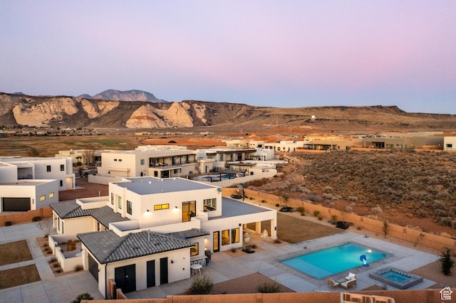 4862 N Sand Cove Cir, St George, UT 84770 - aerial view at dusk with a mountain view