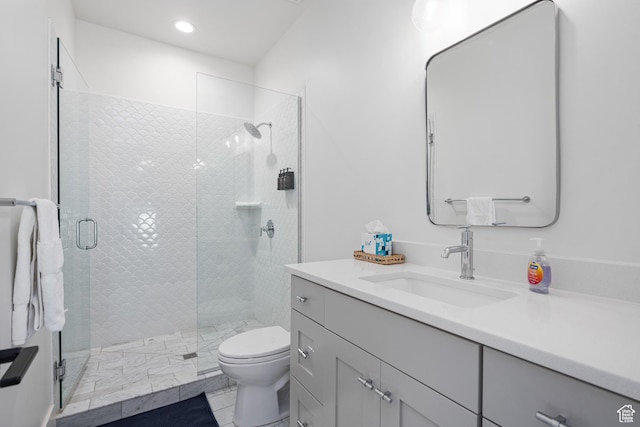 4862 N Sand Cove Cir, St George, UT 84770 - bathroom featuring vanity, tile patterned floors, a shower with door, and toilet