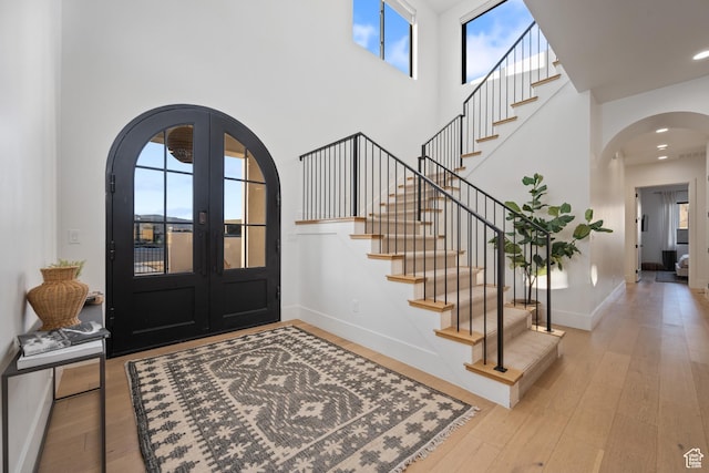 4862 N Sand Cove Cir, St George, UT 84770 - entrance foyer with a towering ceiling, hardwood / wood-style floors, and french doors