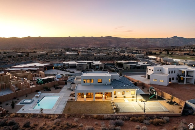 4862 N Sand Cove Cir, St George, UT 84770 - aerial view at dusk with a mountain view