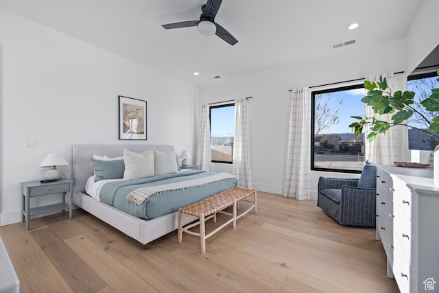 4862 N Sand Cove Cir, St George, UT 84770 - bedroom with ceiling fan and light hardwood / wood-style floors