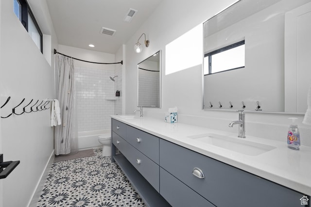4862 N Sand Cove Cir, St George, UT 84770 - full bathroom featuring shower / bathtub combination with curtain, vanity, tile patterned floors, and toilet