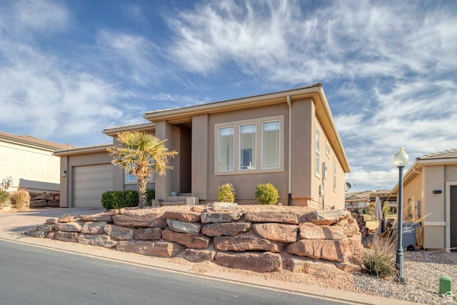 2261 S Tonaquint Dr Unit 8, St George, UT 84770 - view of front of home with a garage
