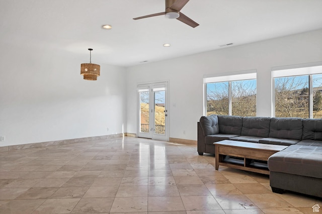 2261 S Tonaquint Dr Unit 8, St George, UT 84770 - living room featuring ceiling fan
