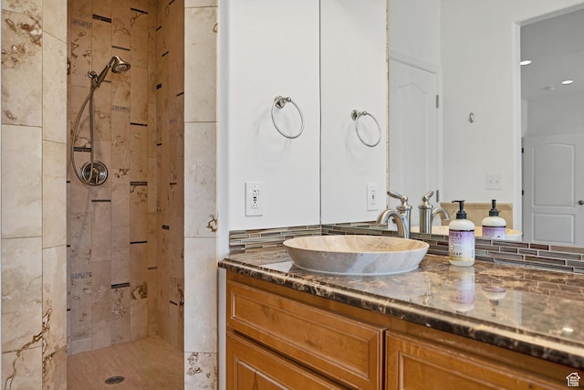 2261 S Tonaquint Dr Unit 8, St George, UT 84770 - bathroom featuring vanity and a tile shower