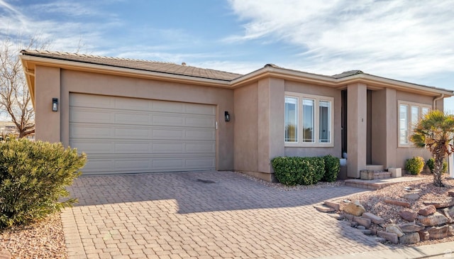 2261 S Tonaquint Dr Unit 8, St George, UT 84770 - view of front of home featuring a garage