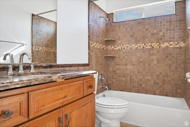 2261 S Tonaquint Dr Unit 8, St George, UT 84770 - full bathroom with vanity, tiled shower / bath combo, and toilet